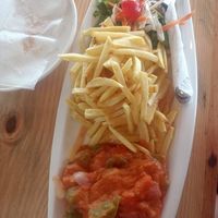 Vegetables curry with fries... at M&J Cafe  in Zanzibar