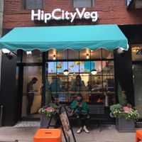 Front entrance with guy on bench (coincidentally, the same person as in one of dbader's photos is sitting in the front!). at HipCityVeg - Union Square in New York City