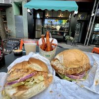 Burger, sweet potato fries, and buffalo chicken sandwich at HipCityVeg - Union Square in New York City
