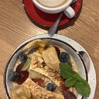 porridge + hafermilch cappucino  at Café Zehnsiebzig in Vienna