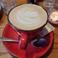 Oatmilk latte at Café Zehnsiebzig in Vienna