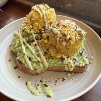 Avocado Toast w/ Chickpea Mash and Pesto Aioli - sooo good  at ROOTED in Walnut Creek