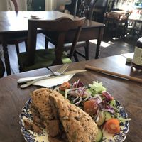 Sausage sandwich with side salad. B had mint pea soup. We also had a light moist ginger and chocolate cake    at Tea by the Lock in York
