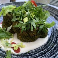 Grilled broccoli on white bean hummus   at Santos Mexican Grill & Bar - Wieden in Vienna