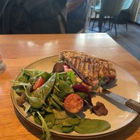 Bread with vegan goat cheese, red beets and salad  at Café Friedl in Vienna