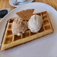 Belgian waffle with half and half (two scoops of ice cream of your choice). at ditto in Cape Town