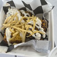 Grilled corn with vegan mayo and vegan cheese (tasted better than it looks)  at El Bigoton in Mooloolaba