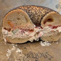 Poppyseed bagel veggie tofu cream cheese tomato at Zucker's Bagels in New York City