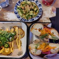 Carrot lax bagel/ Cox stock N Smokey. Side dishes Smashed cucumber, dirty skins potatoes. With local lemonade. Bagel was great structure enjoyed it. Cucumber side fun fresh side di at Yeastie Boi in Helsinki