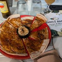 Seasoned bread with hummus at Tabule Rasa in Corfu