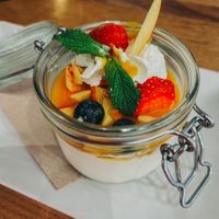 Pana Cotta with fresh berries & fruits 😋  at Galerie Café des Aiguilles in Chamonix-mont-blanc