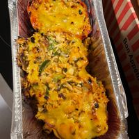 Pepper stuffed with tofu, rice and vegetables and topped with vegan cheese, from Veggie Tempel, Bremen at Veggie Tempel in Bremen