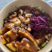 Poké bowl with added mango  at Tozi in Vienna