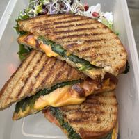 Toasted cheese sandwich comes with a salad  at Ubuntu in Leipzig