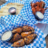 Orange Sesame Wings, Hot Pineapple Wings & Garlic Cheese Bread at Rudy's Pizza in Portland