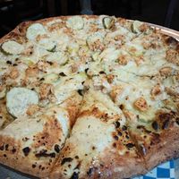 Vegan special with buffalo chicken, blue cheese, and pickles at Rudy's Pizza in Portland