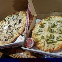 vegan chicken and garlic pizza with Follow Your Heart mozz and jalapeno garlic cheeze bread! at Rudy's Pizza in Portland