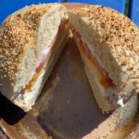 Just Egg breakfast sandwich with just egg, follow your heart cheese, tomato, and vegan cream cheese  at Angeline's Bakery and Cafe in Sisters