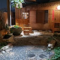 Outdoor walkway to seating area at Fányānwàichá - 凡烟外茶·素食 in Wuhan