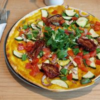Veganer Flammkuchen mit frischem mediterranem Gemüse € 9.50 at Café Cabresso in Augsburg