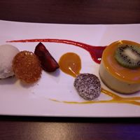 Mango cheesecake, praline and cookie ice cream. The texture of the cheesecake was on point! at Lucky Leek in Berlin