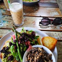 Smashed avo on toast with mushroom and hash brown at St. Crispins Cafe & Events in Port Douglas