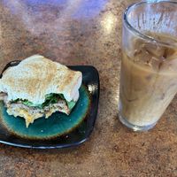 Forager breakfast sandwich and iced coffee with oat milk  at Uncommon in Essex Junction