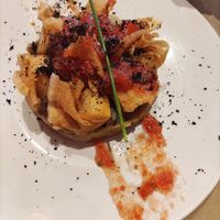 Deep fried crispy tofu on a bed of truffled mashed potatoes at Paprika in Granada