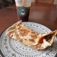 Manaish and stirred Petal & Leaves drink  at Arcana in Playa Del Carmen