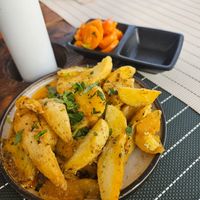 Delicious starters of spicy potatoes and Algarve carrots at Art'aska in Silves