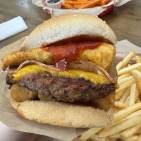 The HUGE breakfast burger + fries   at Nice Burger in Stanton