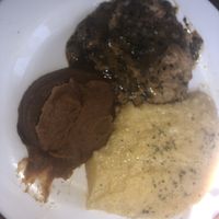 Chicken with grits and sweet potato souflee  at Seasoned Vegan in New York City