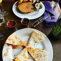 The old fashioned pancakes w/ fermented soy chicken and vegan quesadillas! at Seasoned Vegan in New York City