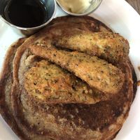 Chicken drumsticks on old fashioned pancakes  at Seasoned Vegan in New York City