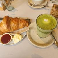 Croissant with strawberry jam and matcha latte at Kaffeemacherei in Frankfurt