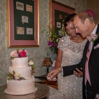 Cutting the beautiful cake!  at UpRising bakery & cafe in Lake In The Hills