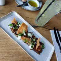 Voorgerecht met aubergine, mega goed bereid (smaakt niet eens meer naar aubergine) en broodje met olijfolie at BUCK Bar Kitchen in Boskoop