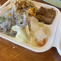 Sweet potato noodles, pumpkin fried rice, “pork” belly, and veggies   at The Vegan Shop in Hilo