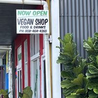 Sign as viewed from the road    at The Vegan Shop in Hilo