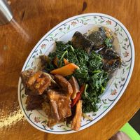 Buffet: crispy fish, pork belly, and sautéd greens  at The Vegan Shop in Hilo