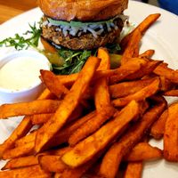 Italian Burger with added vegan mozzarella and avocado at Cafe Flora in Seattle