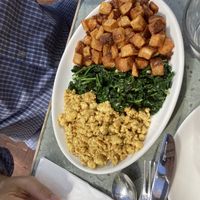 Tofu potatoes and garlicky greens that my omnivore husband loved    at Cafe Flora in Seattle