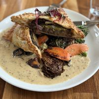 Mushroom Wellington with seared brussel sprouts, mashed potatoes and rapini.   at Cafe Flora in Seattle
