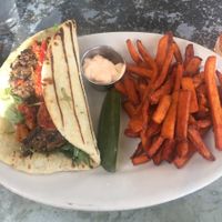 Italian ‘burger’ (sub gf pita) with yam fries at Cafe Flora in Seattle