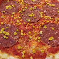 vegan salami pizza with corn  at La Taverna in Amstetten