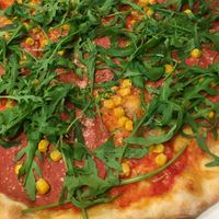 vegan salami pizza with corn and rucola at La Taverna in Amstetten
