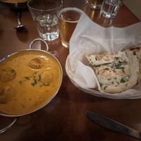 Malali Kofta and garlic naan at Roots Indian Bistro in Los Angeles
