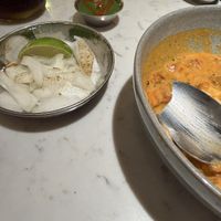 Onions and house hot sauce  at Roots Indian Bistro in Los Angeles