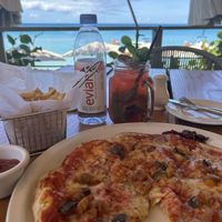 Vegan pizza, strawberry mojito mocktail   at Sea Shed in Speightstown