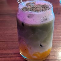 Matcha mango latte with oat milk at L'Quán in Hamburg